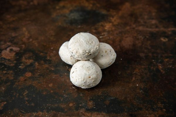 4 dough balls to be baked into multigrain rolls