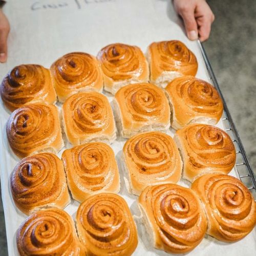 Tray of freshly baked scrolls from Suprima, a wholesale bakery supplier in Sydney