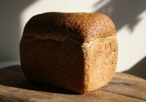 Freshly baked high top loaf made with Suprima's wholesale Vienna frozen dough