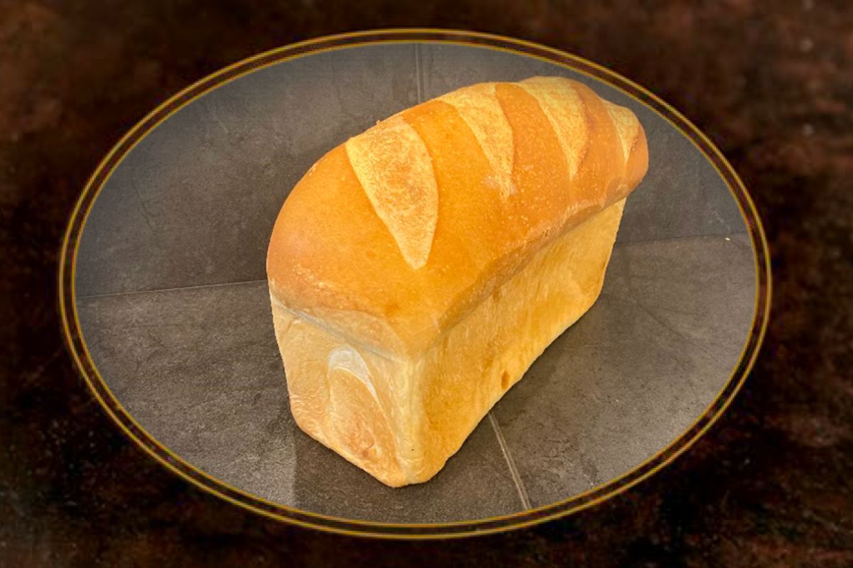 Freshly baked white high top loaf made with Suprima's White Vienna frozen dough