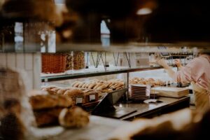 Cafe counter with freshly baked rolls and loaves