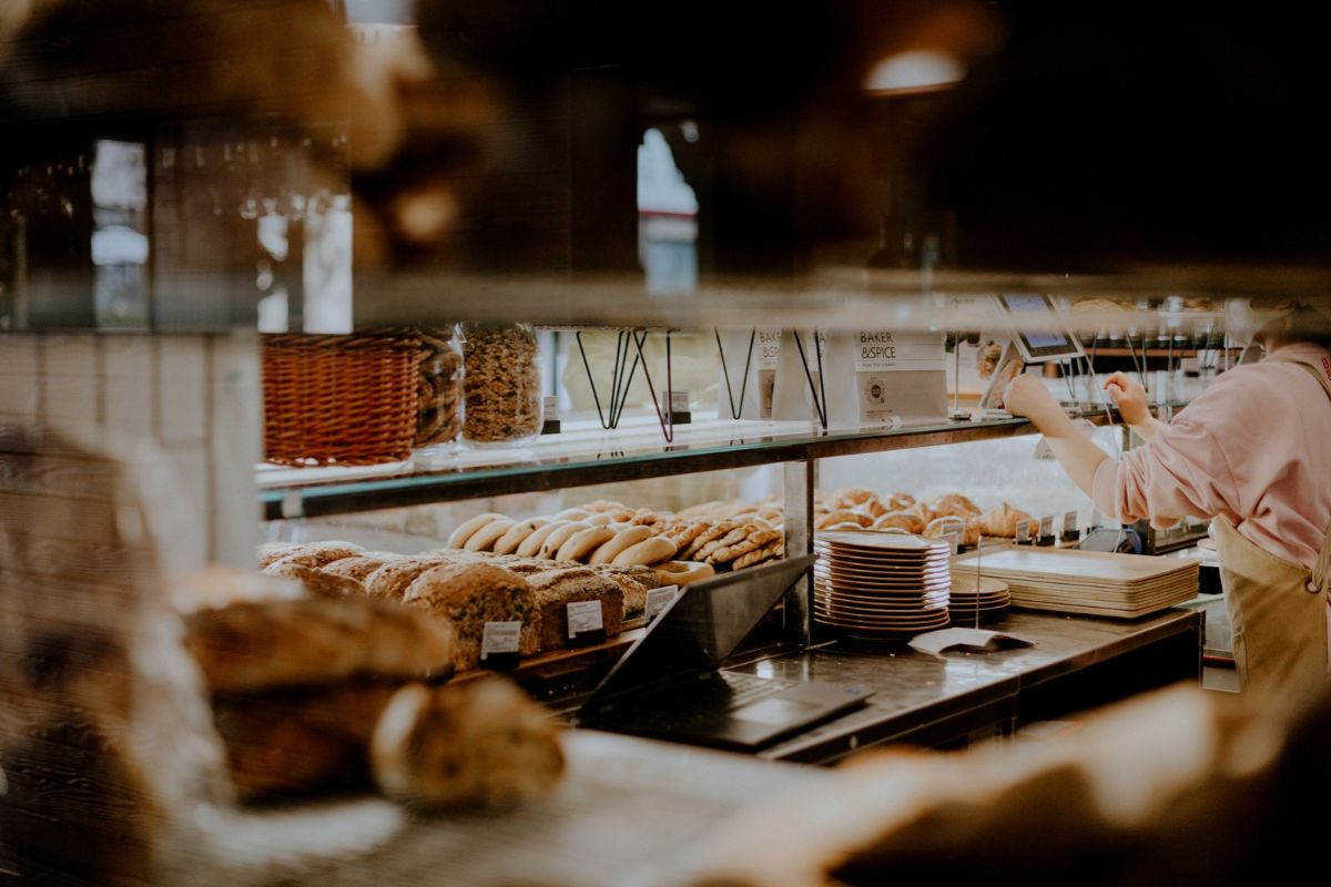 Cafe counter with freshly baked rolls and loaves